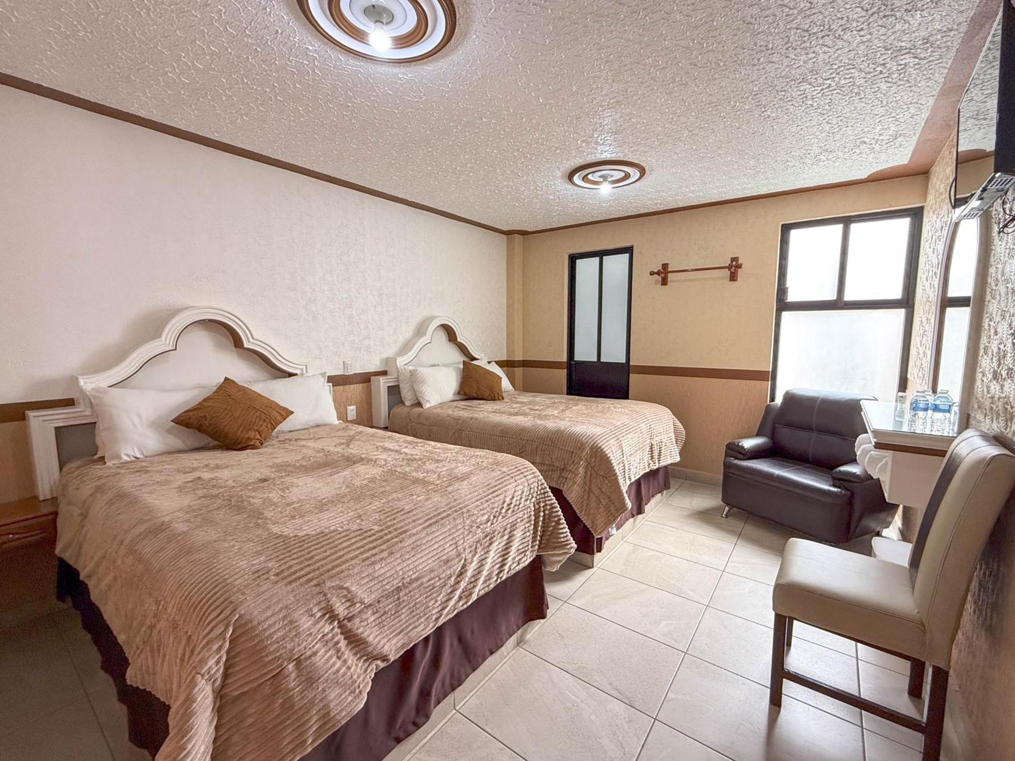 Hotel La Gloria Чигнауапан Екстериор снимка