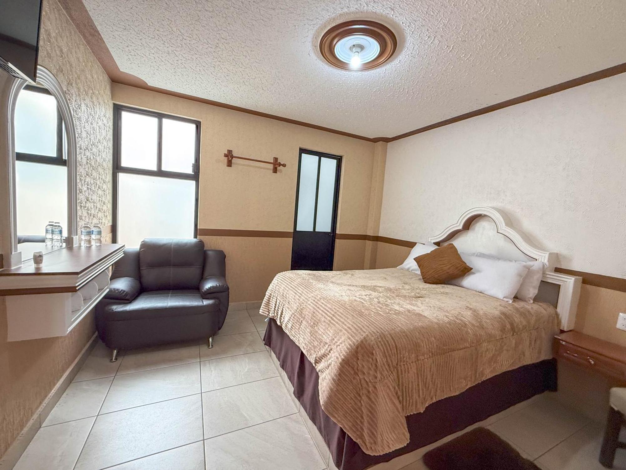 Hotel La Gloria Чигнауапан Екстериор снимка